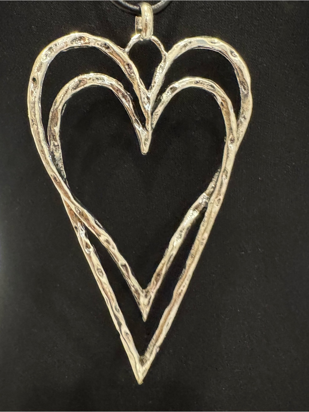 Silver color Double-Heart Pendant Necklace on 30‎ inch long black cord.